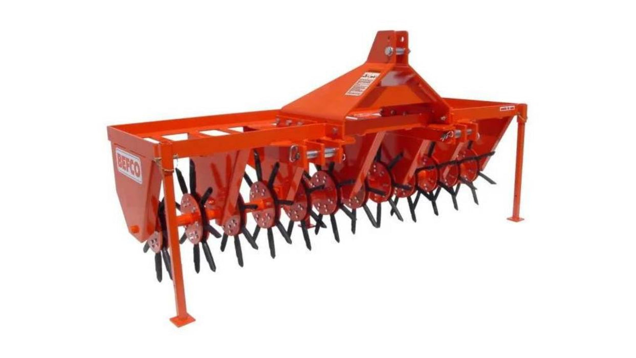 Heavy-duty BEFCO BCA HD tractor core aerator with rotating spoon hubs for deep-tine turf aeration and soil compaction relief.